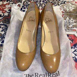 Christian Louboutin round toe wedge heels